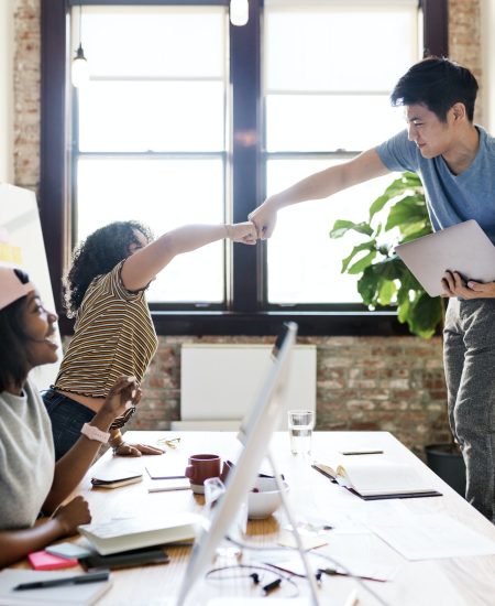 diverse-team-celebrate-success-with-fist-bump.jpg